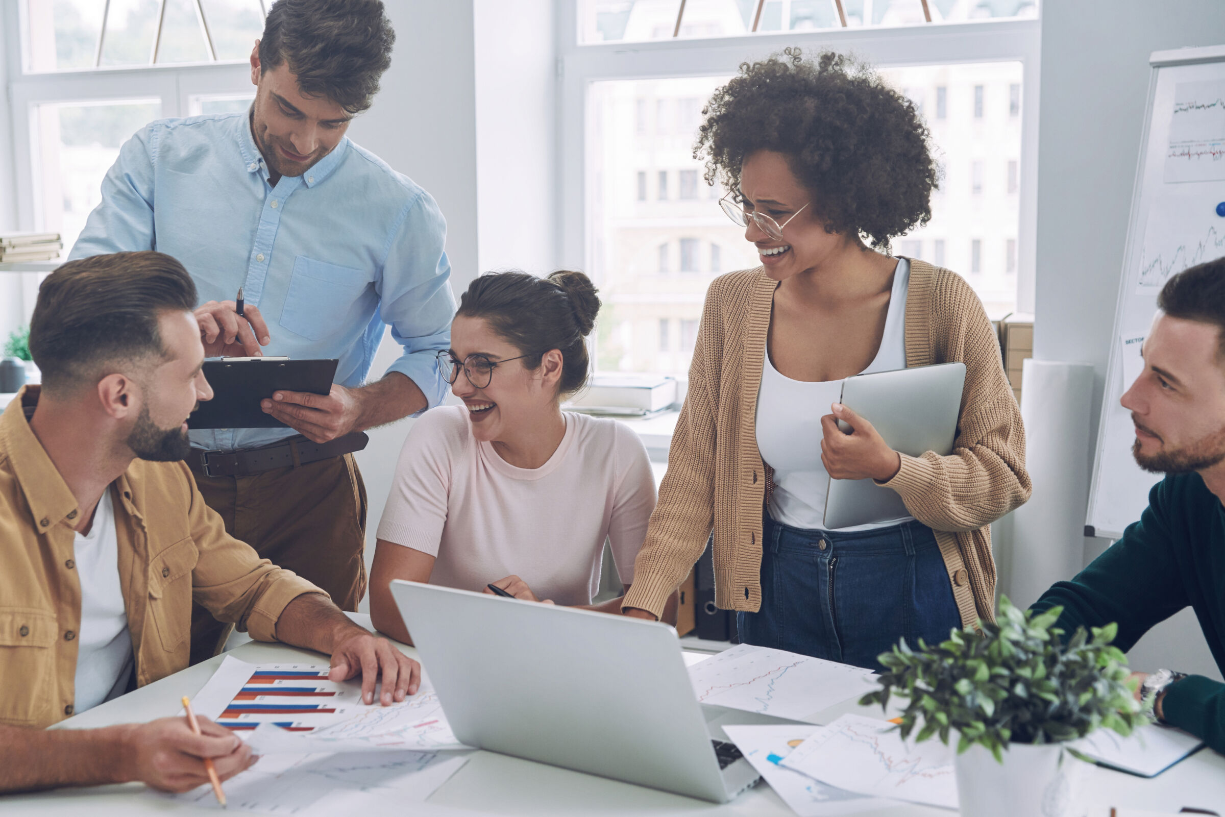 Sage 70 consultants with clients in office